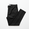 Classic Black Pants flat lay on white background